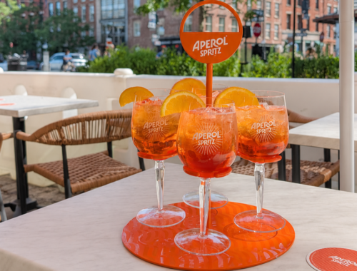Celebrate the Summer Solstice with the return of patio dining and the launch of our Summer Aperol Spritz Menu on Sunday, June 21. Enjoy five refreshing Aperol cocktails, including a Classic Aperol Spritz for just $9.